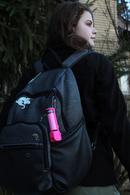 Personal Pepper Spray - Neon Pink on backpack